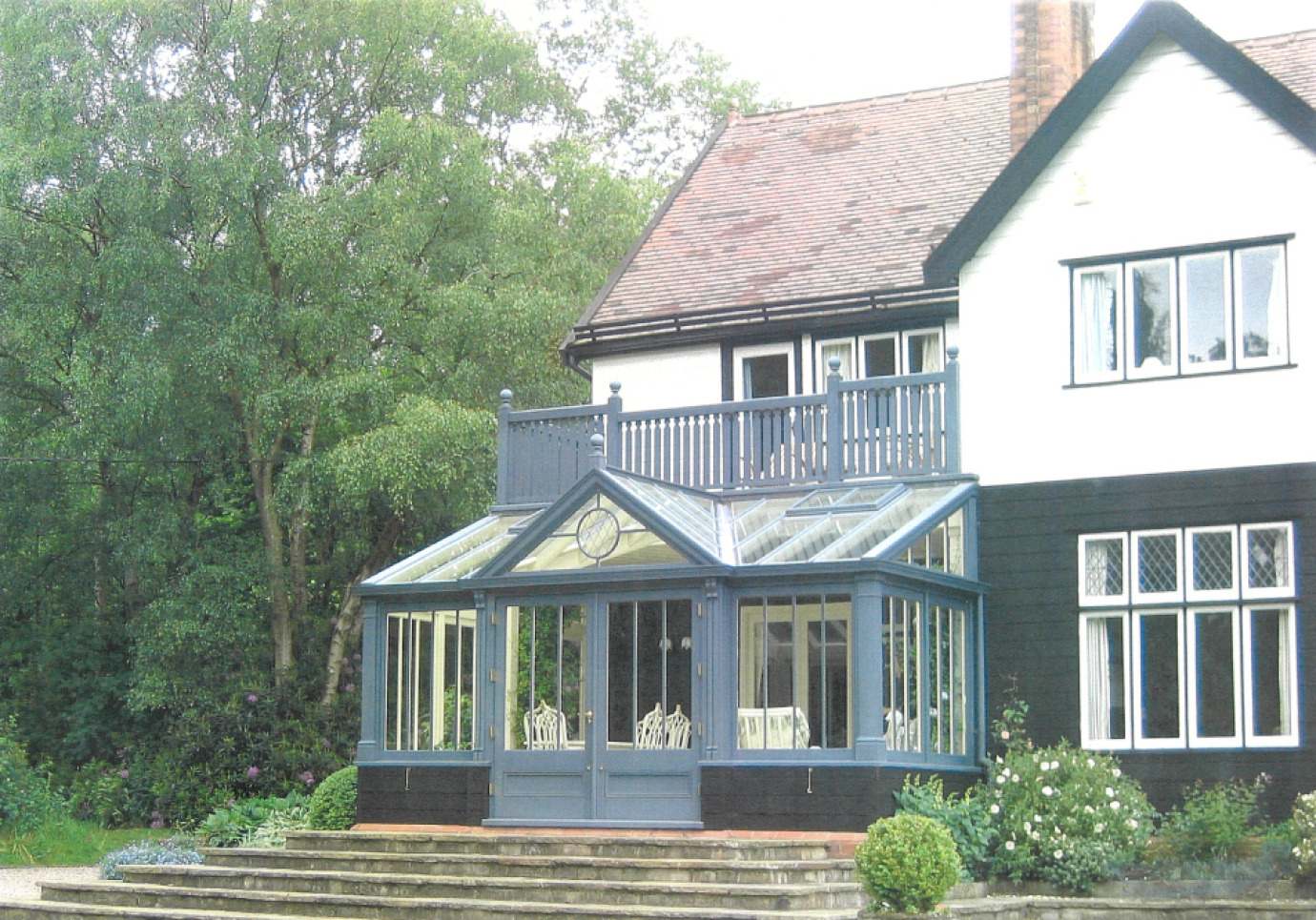 Gabled conservatory with balcony